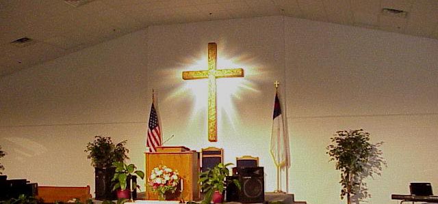picture of cross illuminated at Heritage Bible Church, Panama City, FL